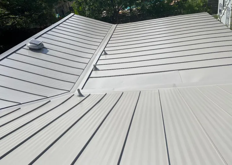 Solar attic fan installed on a metal roof for Roof Ventilation in Damascus